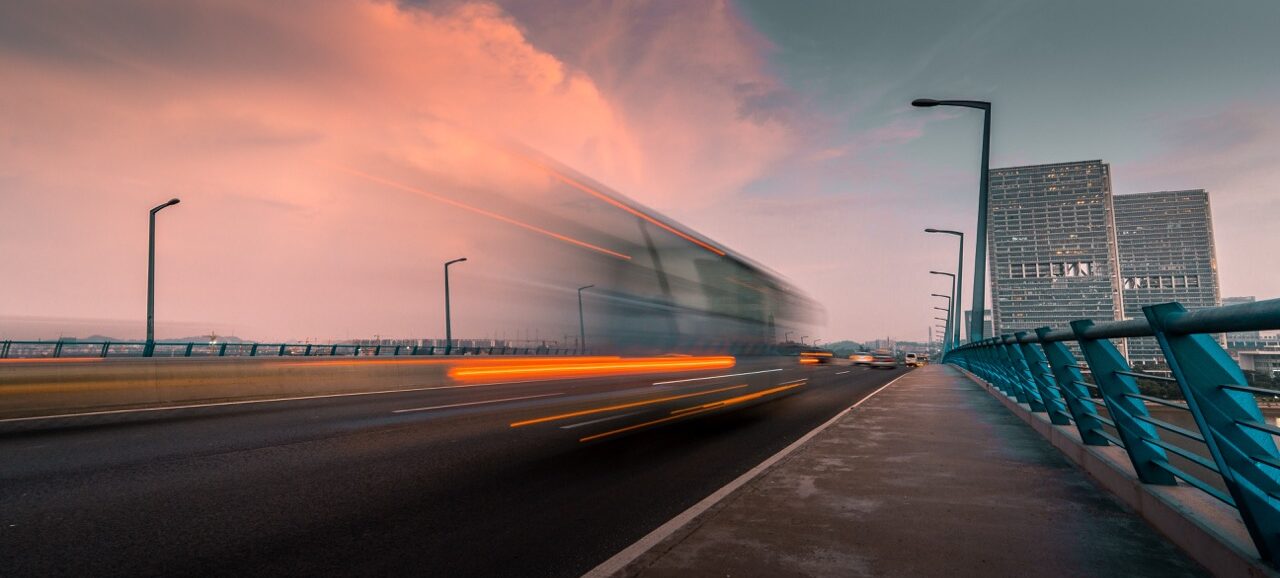 Fast-moving traffic in a city at night