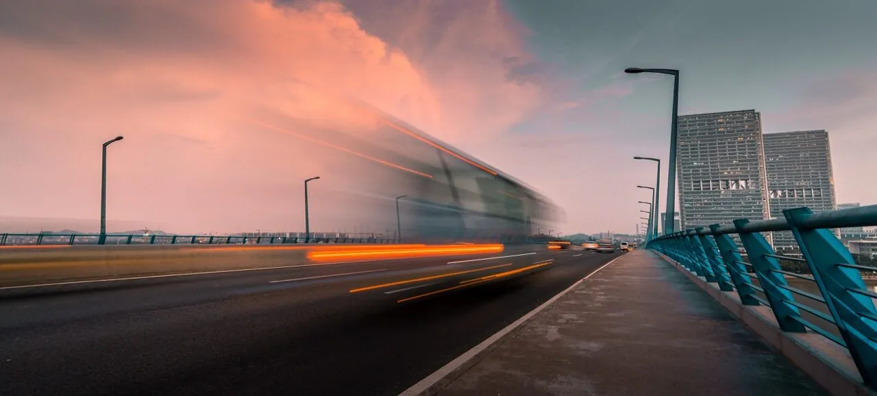 Fast-moving traffic in a city at night